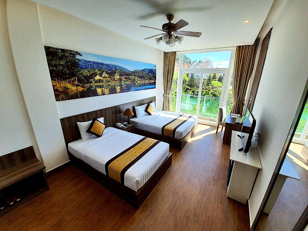 nhung-khach-san-resort-da-lat-dalat-wonder-resort-10” width=